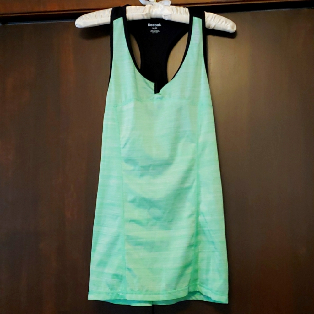 Medium light green reebok tank